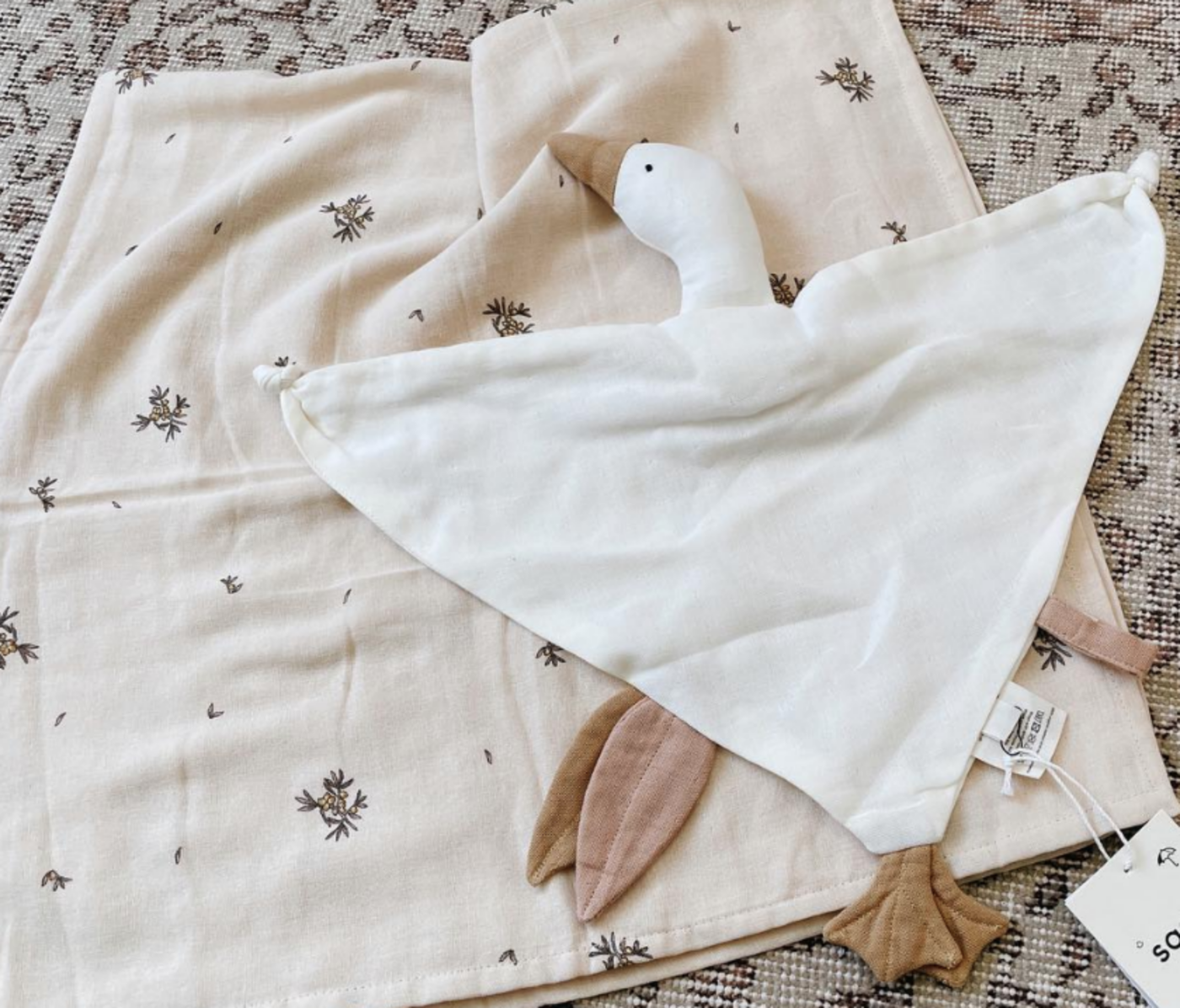 Hula Swaddle 100x100 cm Sea Buckthorn en bliki cream